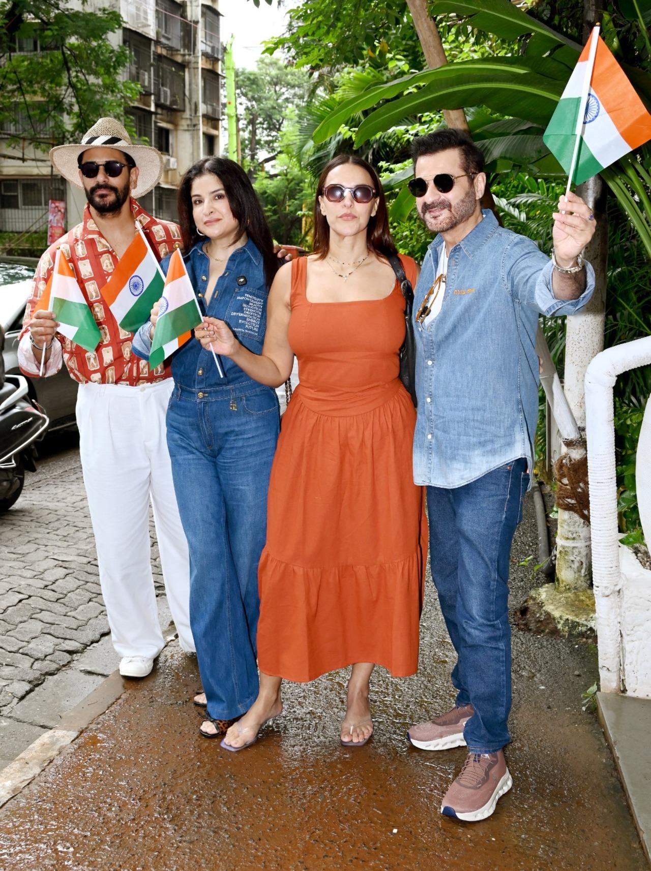 Neha Dhupia and Angad Bedi were seen posing with Sanjay and Maheep Kapoor in the city as they waved tricolours on the occasion of Independence Day.